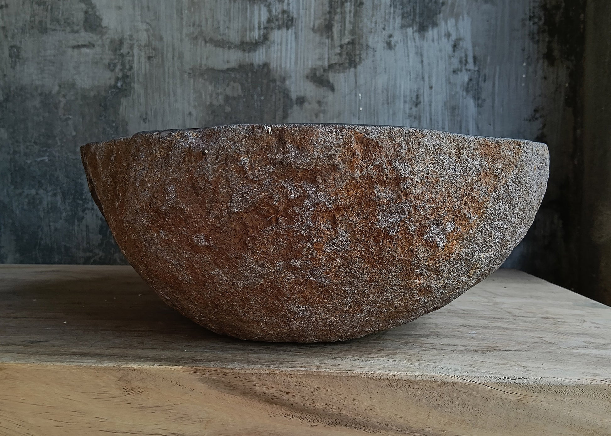 Right side view of oval dark brown river stone vessel sink 6636-4638

