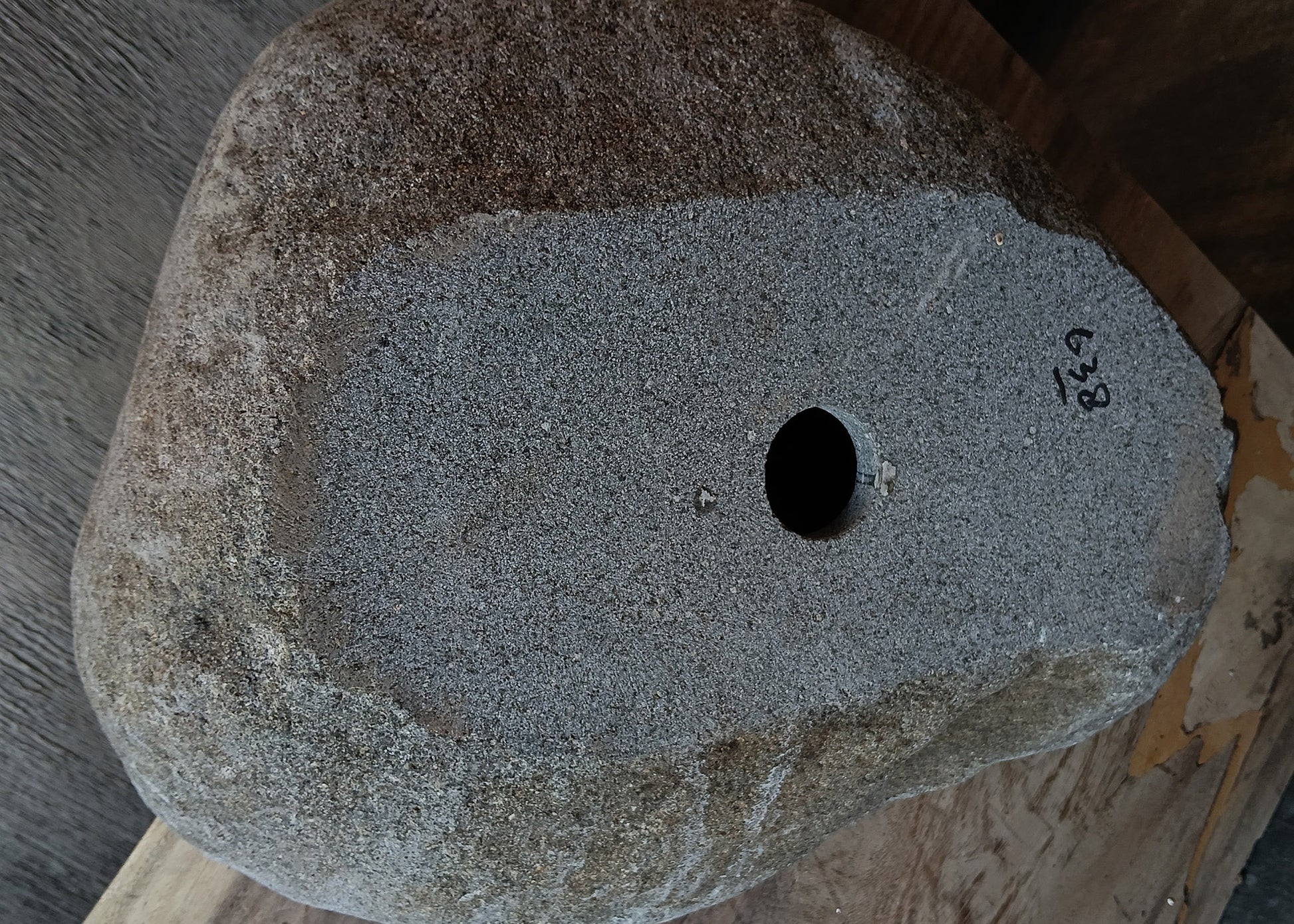 Bottom view of handcrafted rectangular dark gray river stone sink 6638-4437
