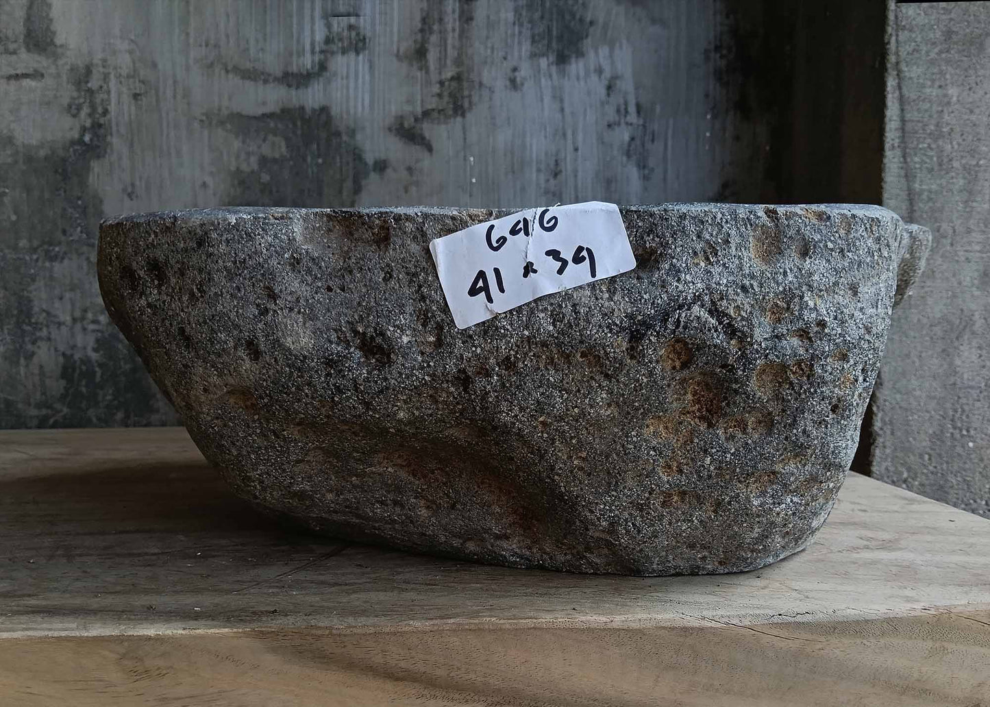Front view of handcrafted irregular dark gray river stone sink 6646-4134
