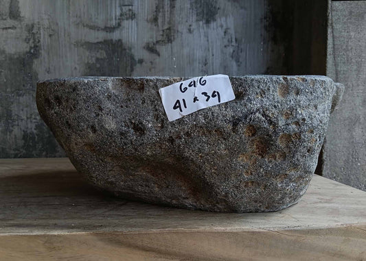 Front view of handcrafted irregular dark gray river stone sink 6646-4134
