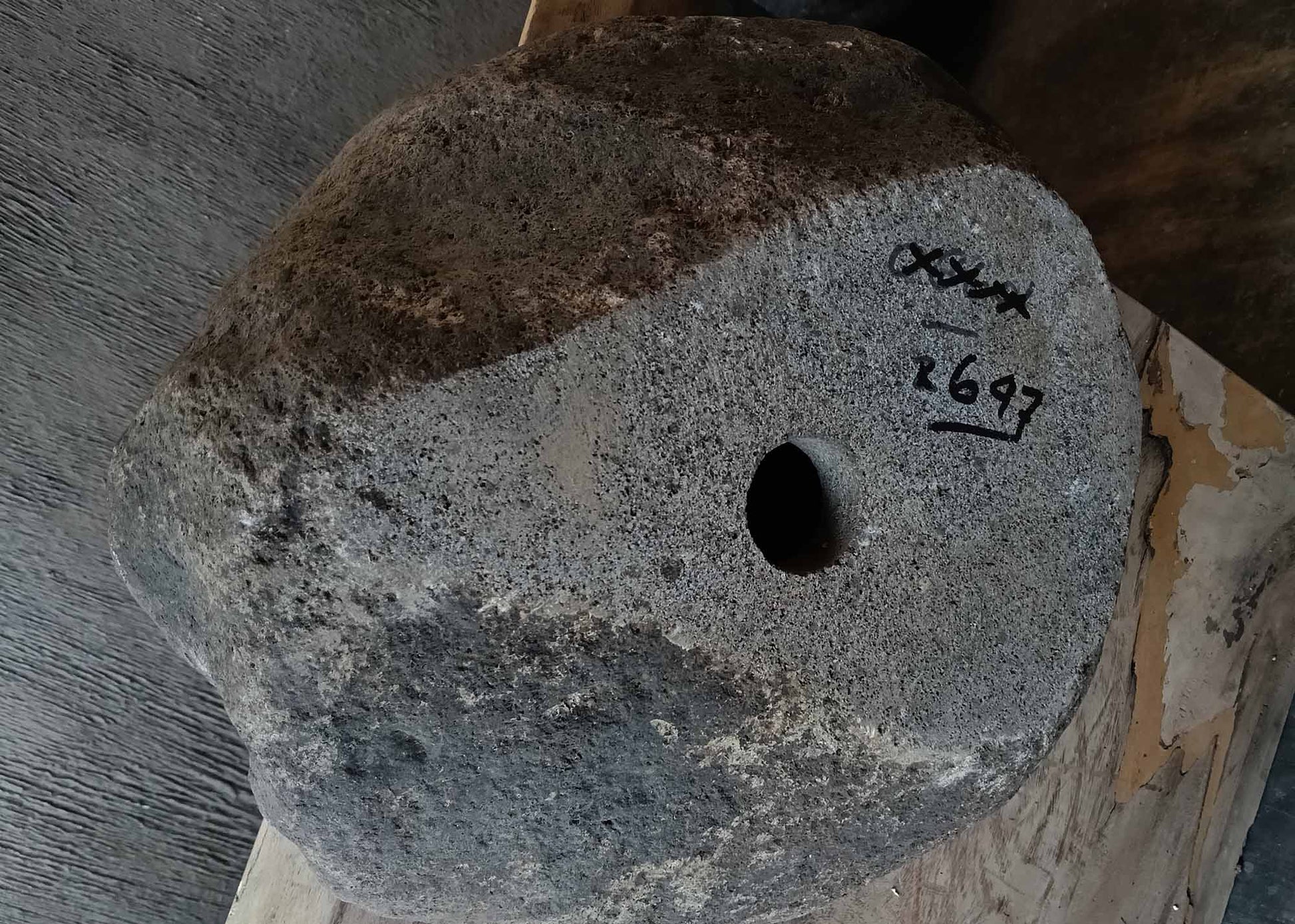 Bottom view of handcrafted round dark gray river stone sink 6647-3737
