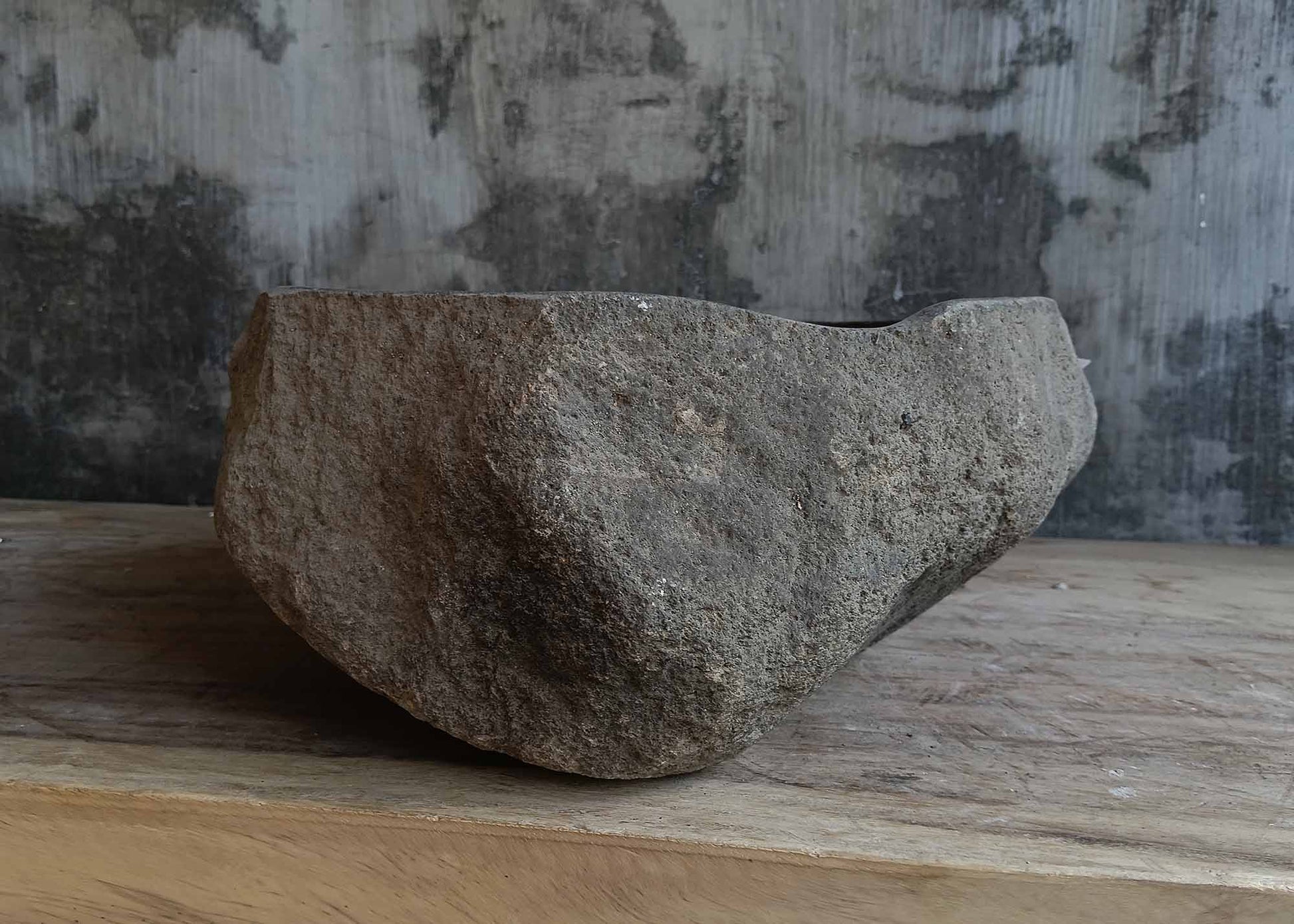 Right side view of round dark gray river stone vessel sink 6647-3737
