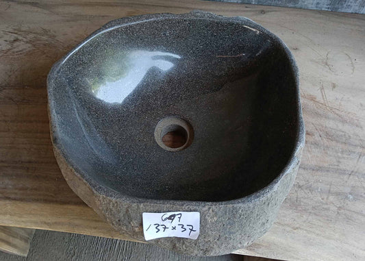 Top view of round dark gray river stone sink 6647-3737 with polished interior
