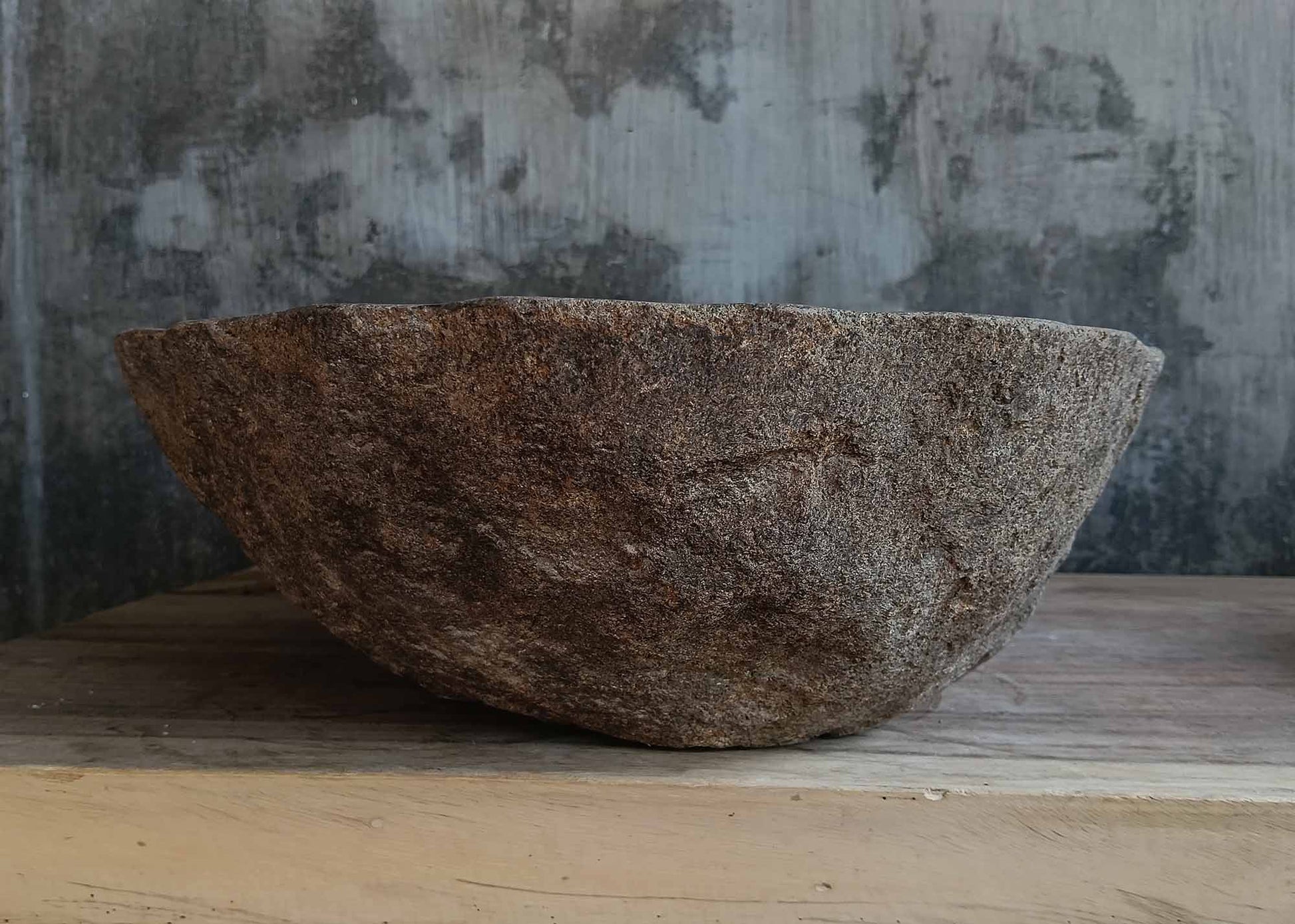 Right side view of oval light brown river stone vessel sink 6656-5643
