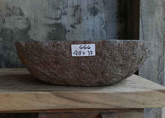 Front view of handcrafted oval dark gray river stone sink 6666-4835
