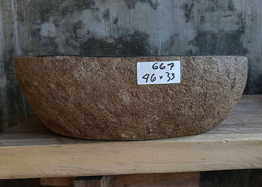 Front view of handcrafted oval dark gray river stone sink 6667-4633
