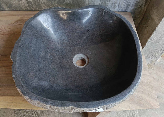 Top view of handcrafted dark gray river stone sink 6674-4542 with polished interior
