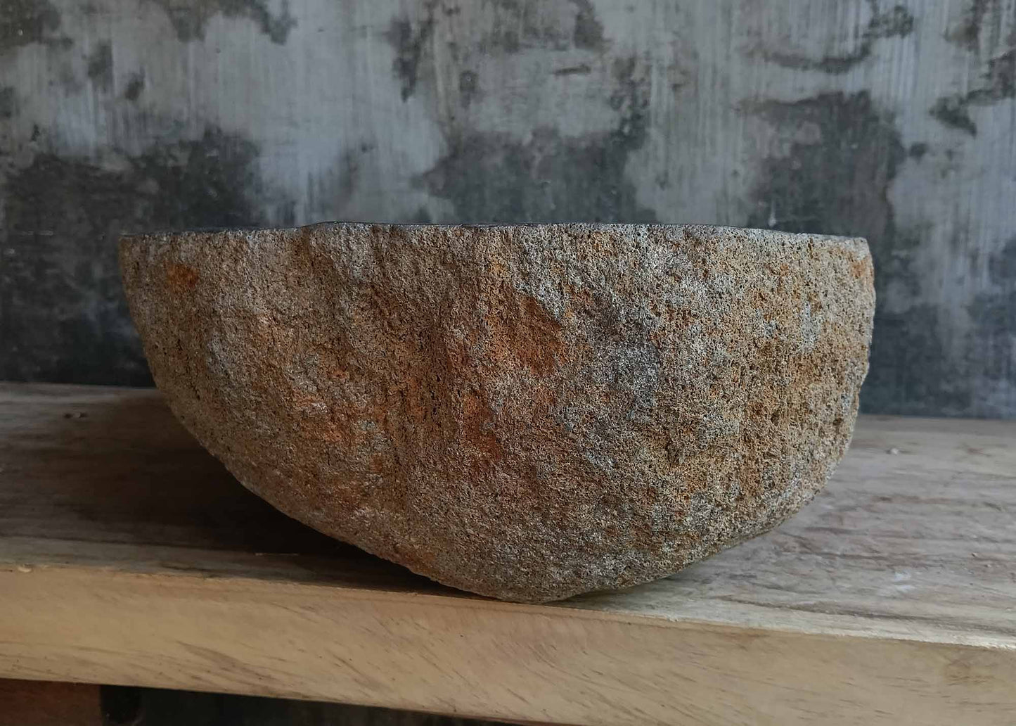 Right side view of handcrafted brown-gray river stone sink 6681-5837 with rustic stone texture
