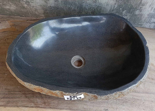 Top view of handcrafted brown-gray river stone sink 6681-5837 with polished interior
