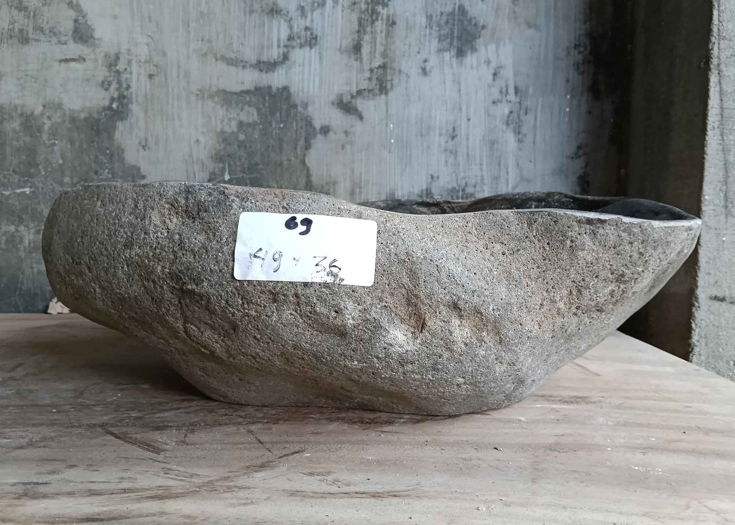 Back view of 19×14 inch sink in gray and beige tones with unique patterning and raw stone texture
