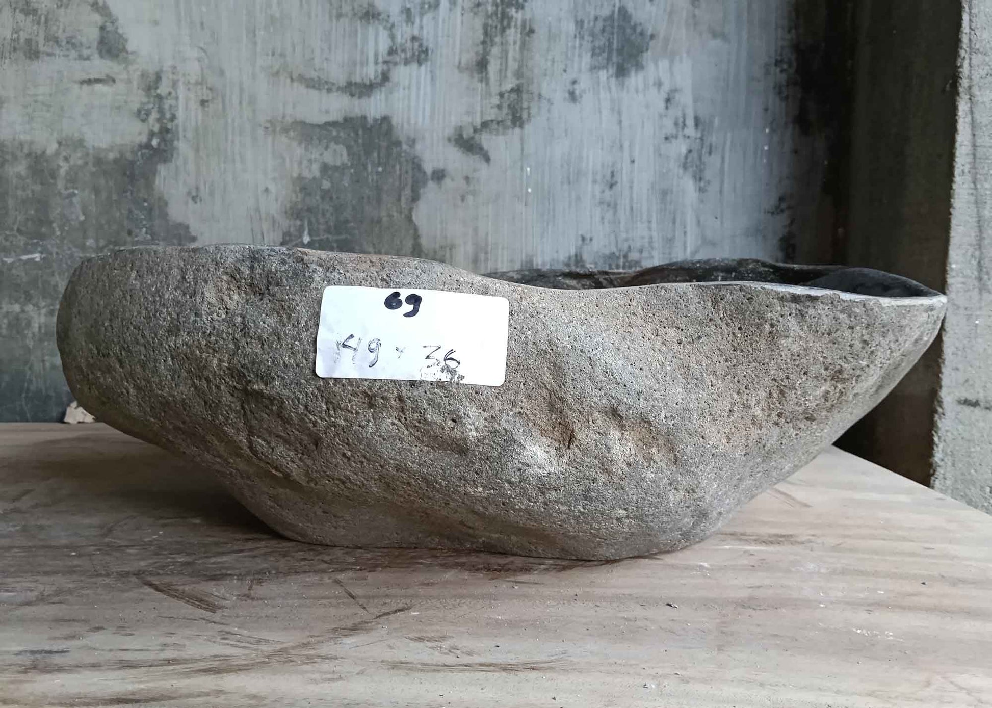 Back view of 19×14 inch sink in gray and beige tones with unique patterning and raw stone texture
