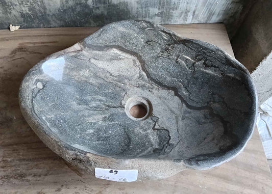 Top view of 19×14 inch river stone sink with rare gray and light swirls and irregular shape
