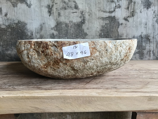 Front angle of rounded sink 6131-4846 showing wave-like edges and stone texture
