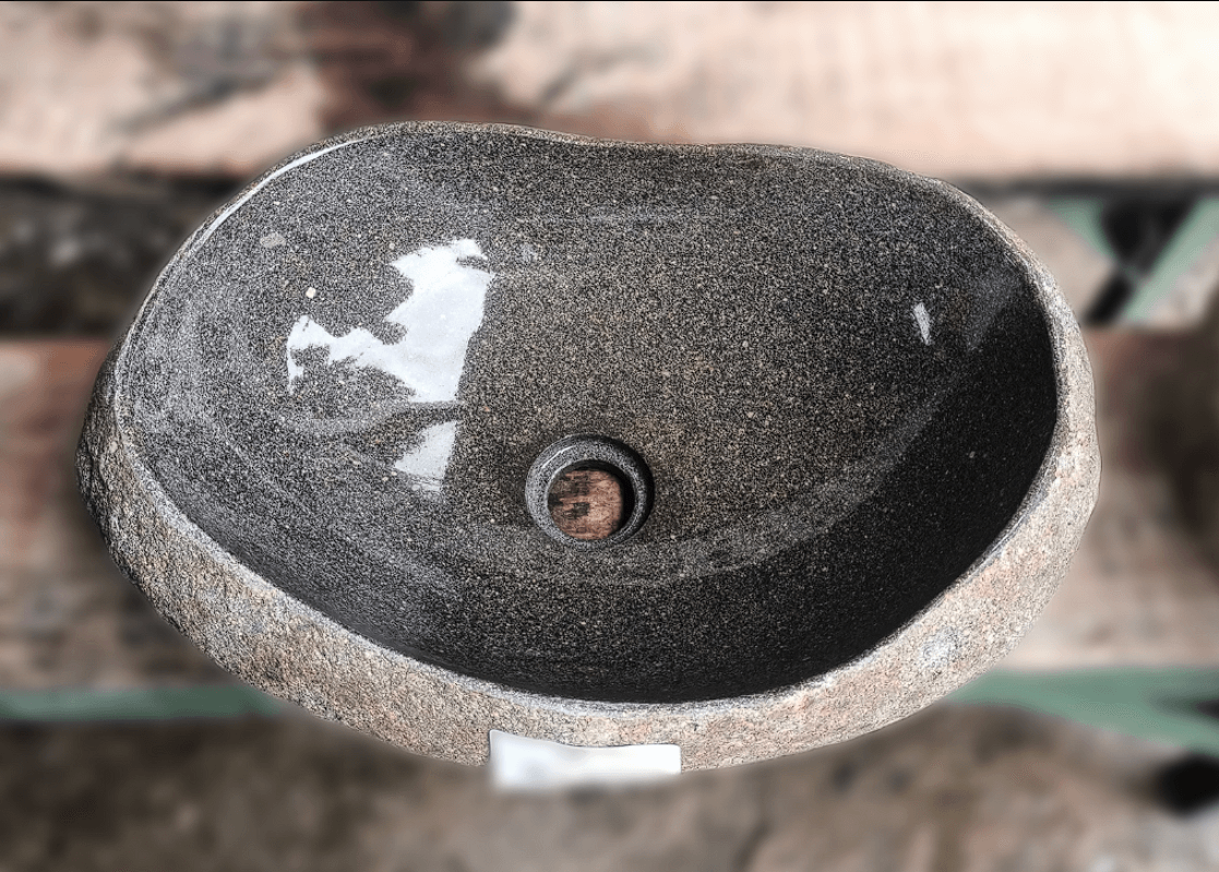 Top view of handcrafted grey 18×13 inch river stone sink