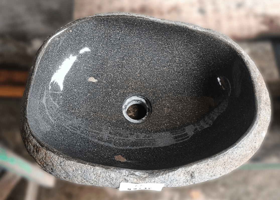 Top view of handcrafted grey 19×14 inch river stone sink