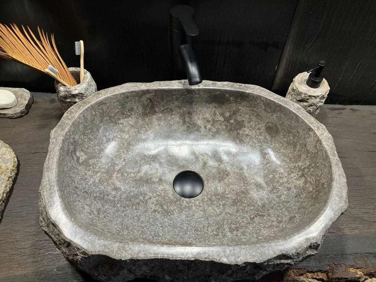 Top view of GMS-037 gray marble sink showing cloudy stone pattern and irregular oval basin