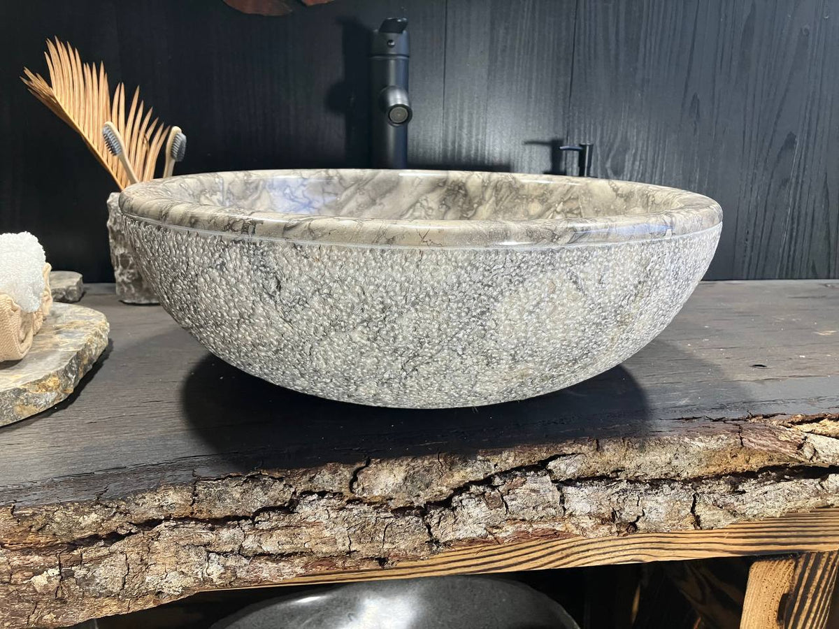 Top view of GMS-099 round gray marble vessel sink with flowing natural veining