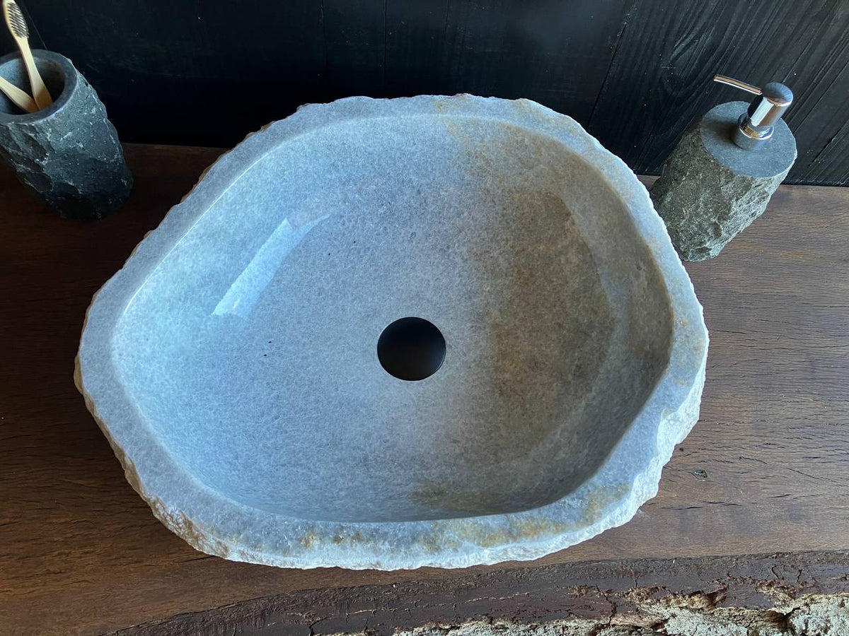 Onyx vessel sink OSS-005 showing a smooth interior with small brown mineral spots