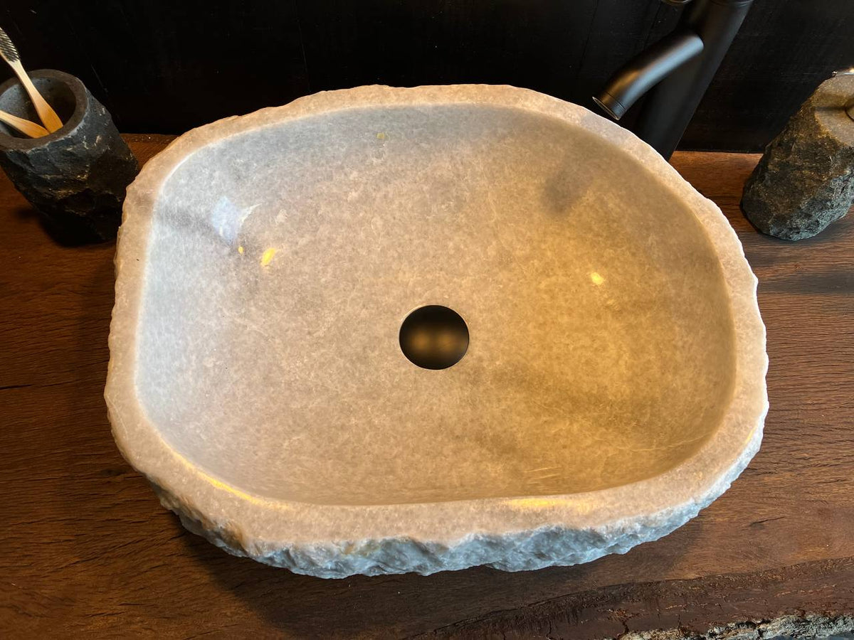Onyx stone sink OSS-005 showing its smooth basin and natural stone texture