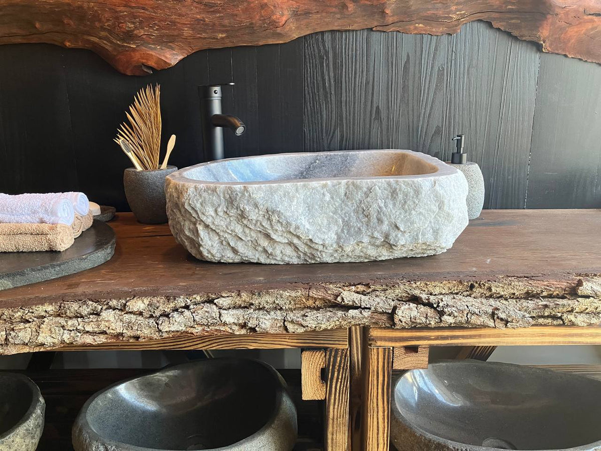 White and light gray onyx vessel sink OSS-007 with a naturally rough exterior
