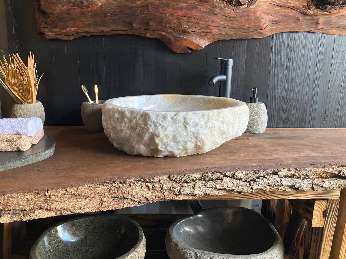 White and light gray onyx vessel sink OSS-008 with a rough chiseled exterior