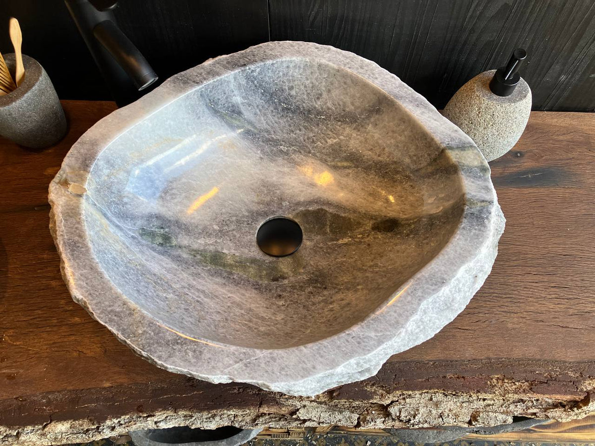 Top view of onyx sink OSS-5080 showing natural bands inside the basin and a repaired edge