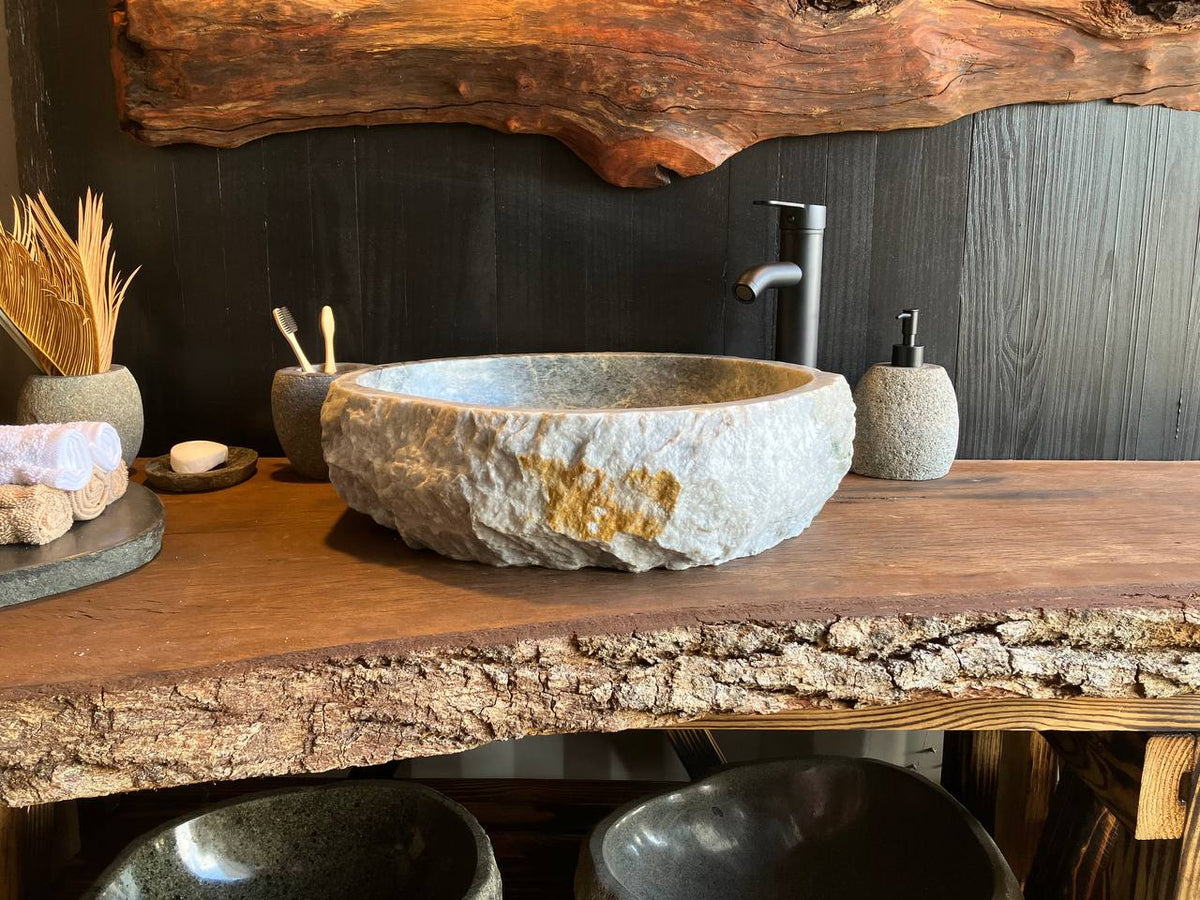Natural onyx vessel sink OSS-5094 with a rough chiseled exterior