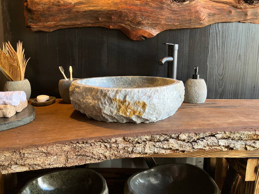 Natural onyx vessel sink OSS-5094 with a rough chiseled exterior