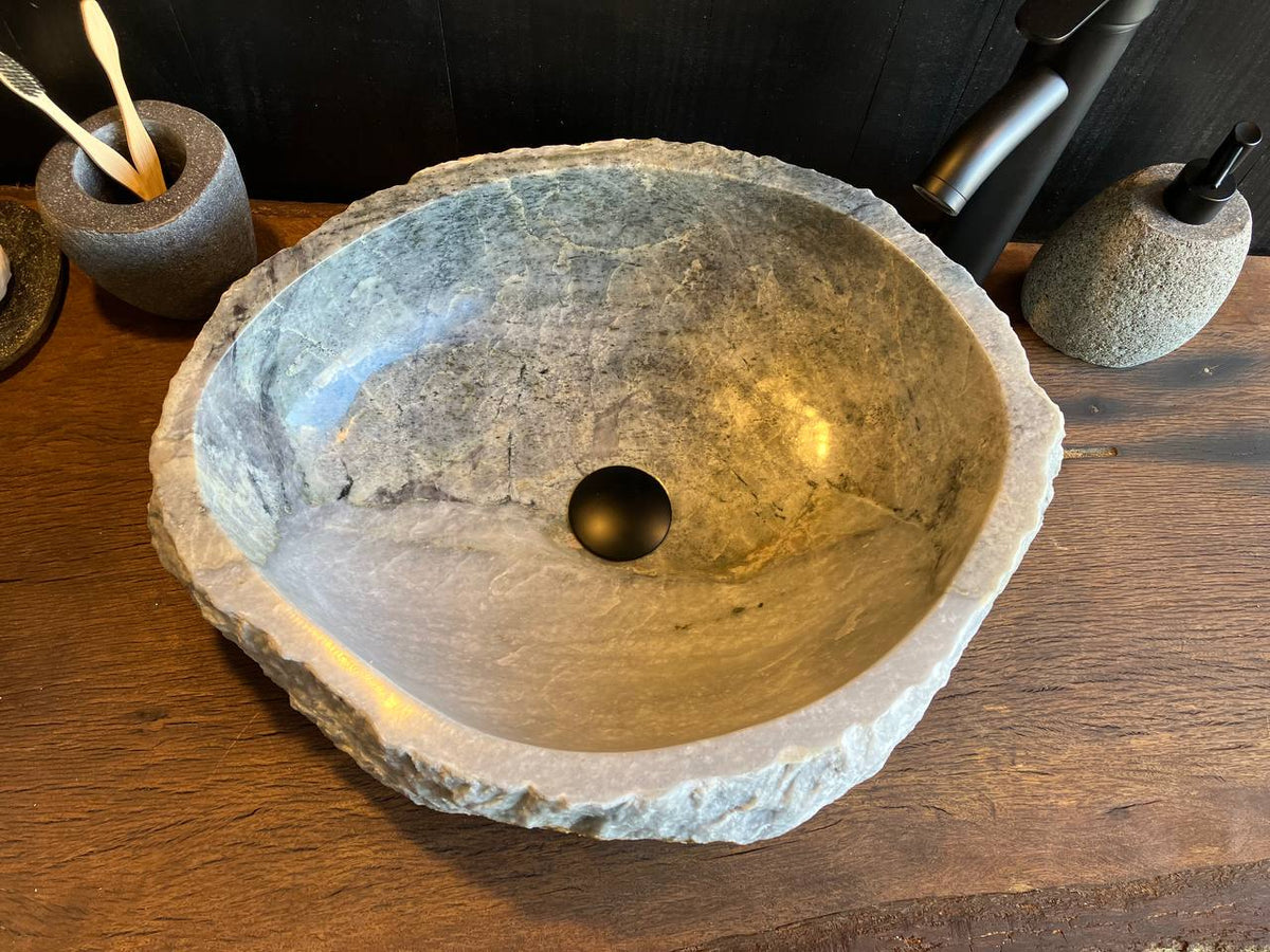 Onyx stone sink OSS-5094 showing its smooth basin and distinctive mineral inclusions