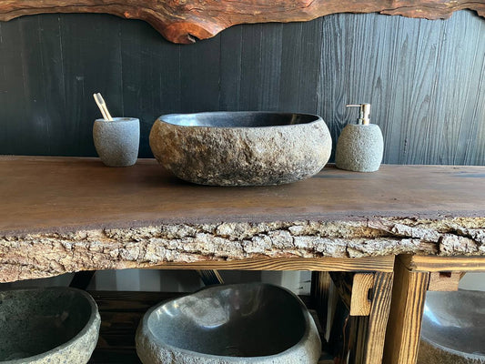 Dark oval river stone vessel sink RSC-081 with a natural textured exterior