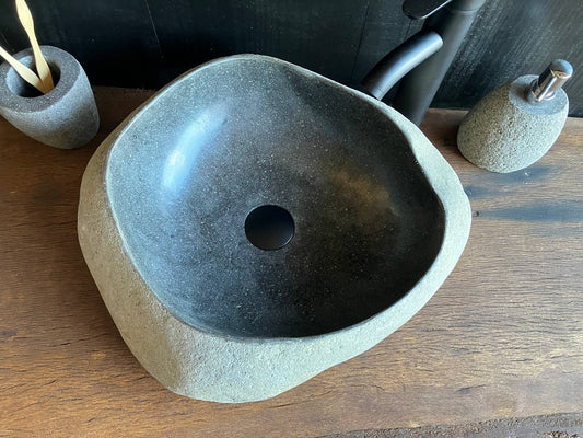 Top view of river stone sink RSC-085 showing its asymmetric outline and basin