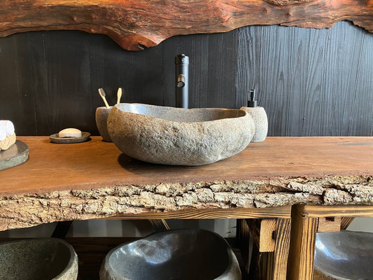 Natural river stone vessel sink RSC-086 with a textured exterior