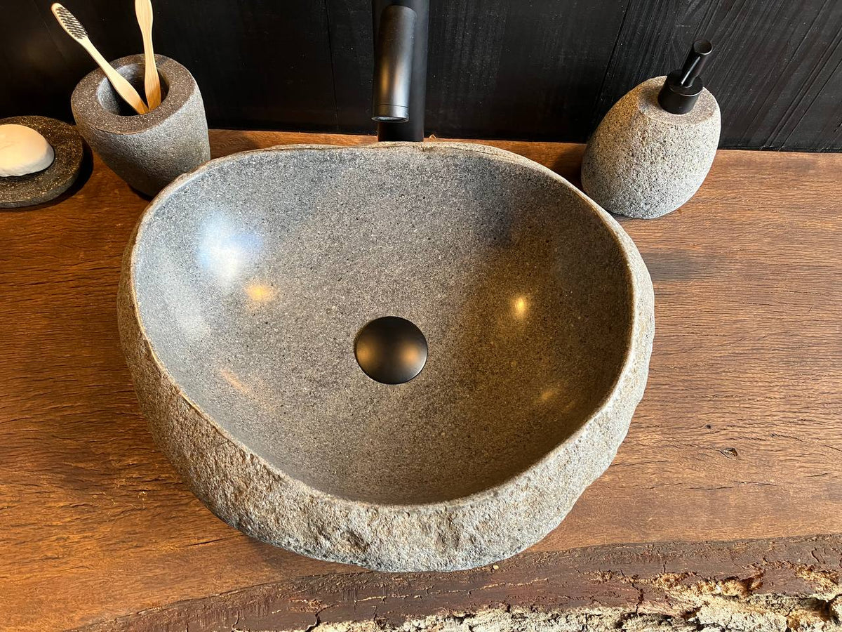 Top view of river stone vessel sink RSC-086 showing its basin and natural stone outline