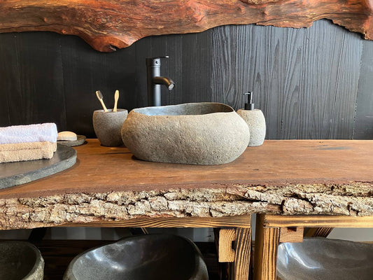 River stone vessel sink RSC-087 with a dark basin and natural textured exterior