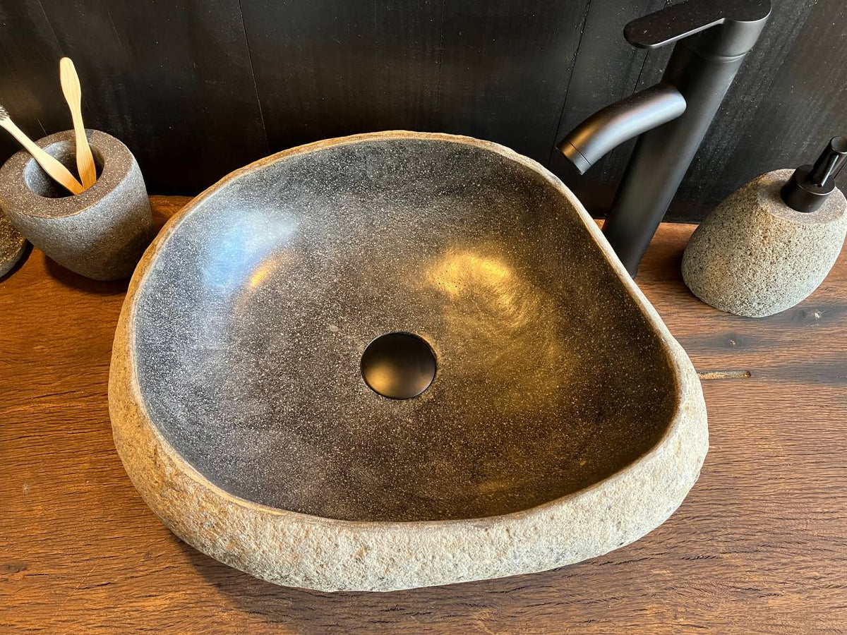 Top view of river stone sink RSC-088 showing its black interior basin