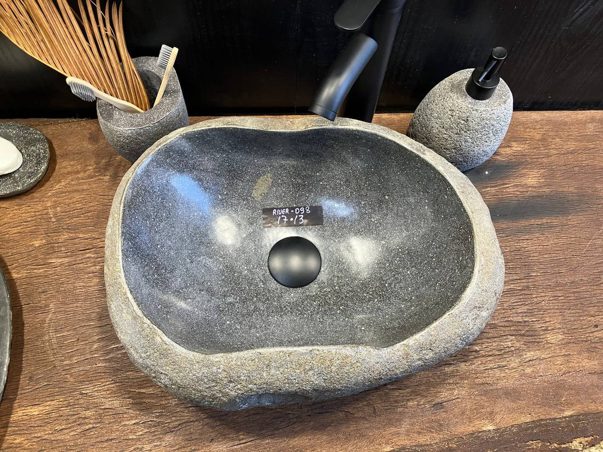 Textured gray-beige exterior and natural cavity on RSS-098 river stone sink