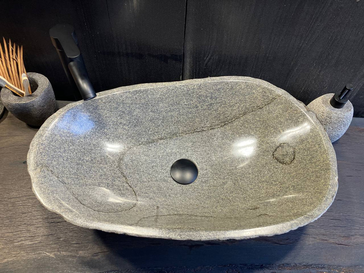 Rugged dark gray-brown exterior of the RSS-101 natural river stone sink
